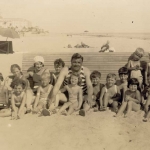 Babe Ruth and Claire on the Beach With Kids